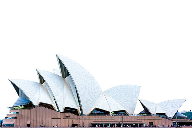 Sydney's Opera House roofline against white background with copy space Sydney, Australia - November 20, 2016: Closeup roofline 'The sails' of Sydney's Opera House against white background opera house stock pictures, royalty-free photos & images
