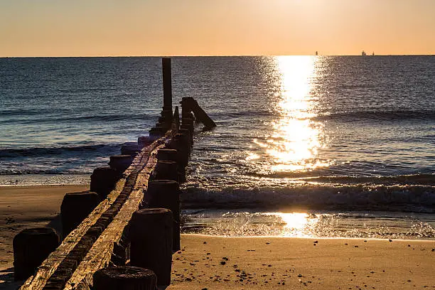 Photo of Dock Pilings at Sunrise at Buckroe Beach