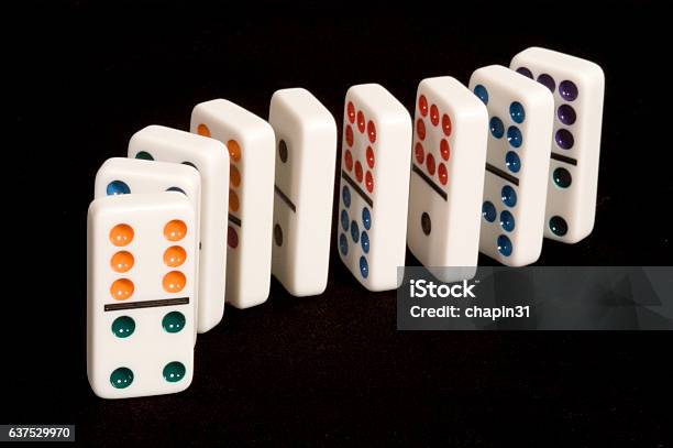 Dominoes In A Curved Line Stock Photo - Download Image Now - Domino, Tile, Stack