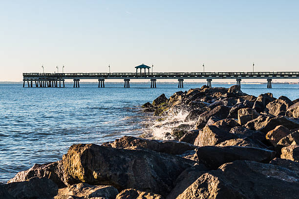 istock Waves Crash on Jetty at Buckroe Beach 637531924