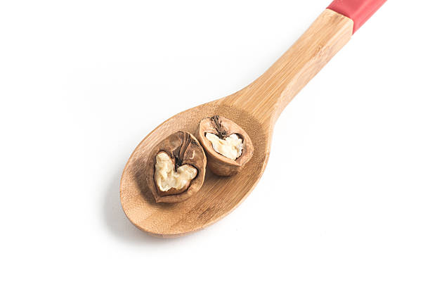 クルミのハート型 - walnut pod nutshell cross section ストッ��クフォトと画像