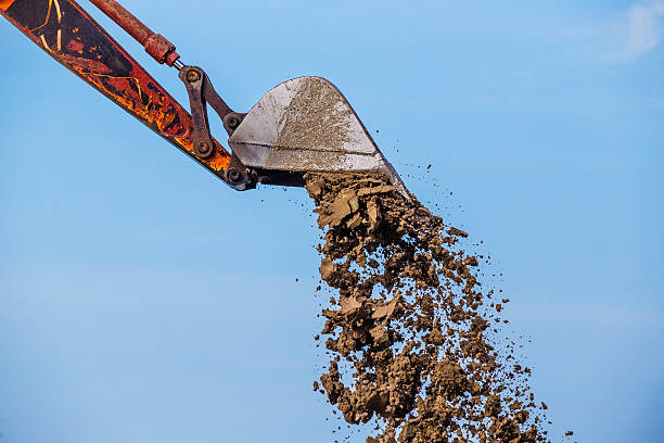 istock Excavator on the reclamation land. 637533664