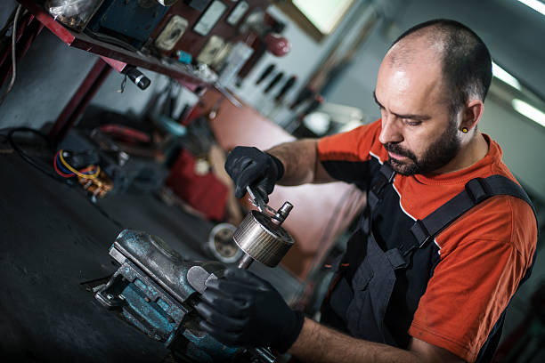 istock Craftsman machine piece and repairing 637534326