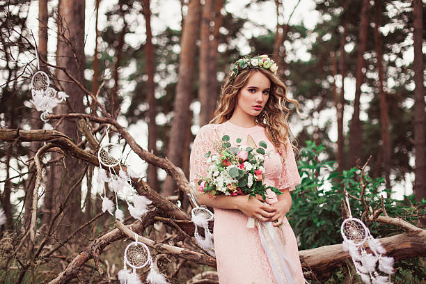istock Carefree Adorable Bride With Bouquet In Nature 637534512