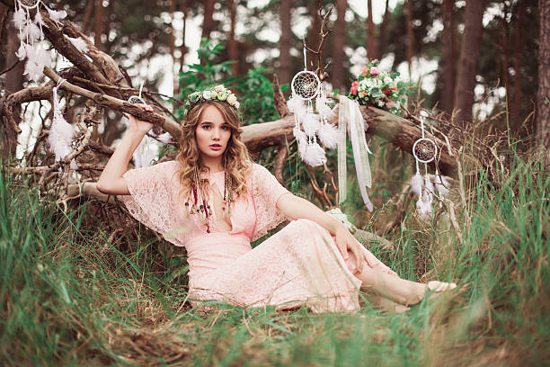 istock Gorgeous Bride With Dream Catchers In Forest 637534930