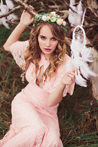 istock Young Girl With White Dream Catcher 637535048