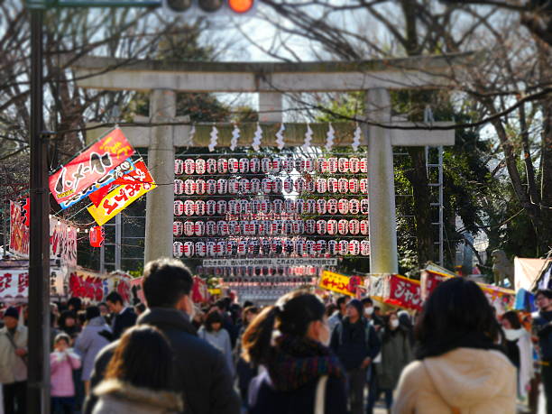 Tokyo, Japan-January 1, 2017: A shrine is a place of worship of Shinto religion. This is an entrance gate of Okunitama shrine, torii. 