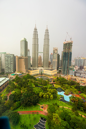 Kuala Lumpur, Malaysia - December 25, 2016: Cityscape of the Kuala Lumpur and Petronas Twin Towers. Kuala Lumpur, Malaysia.