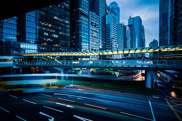 istock urban traffic with cityscape 637542764