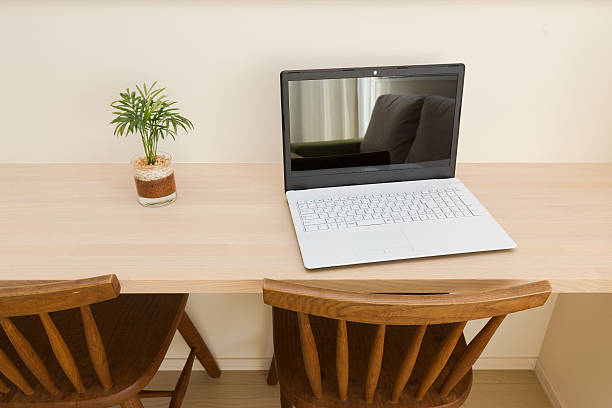 istock Laptop and living room 637542798
