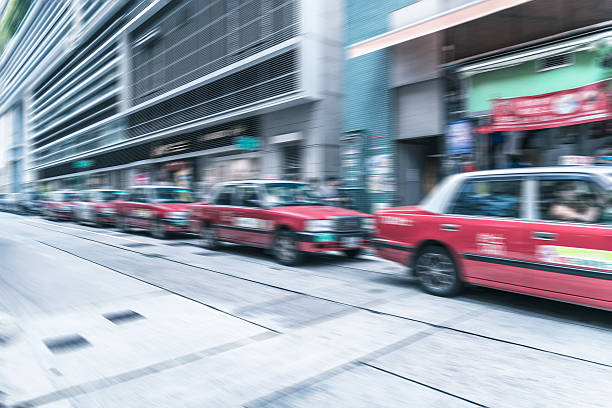 istock taxis parked along the street 637543314
