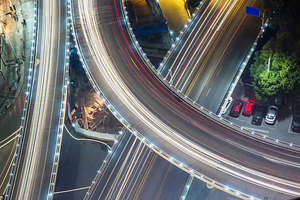 istock urban traffic with cityscape 637544414