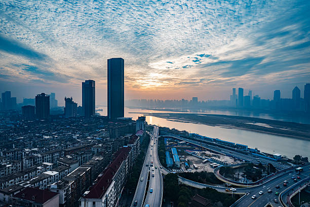 istock urban traffic with cityscape 637544830