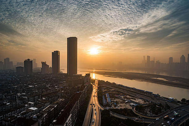 istock urban traffic with cityscape 637544882