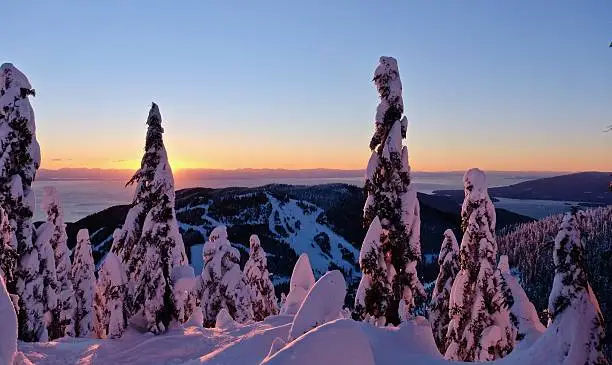 Photo of Ski runs on Cypress Mountain at sunset.
