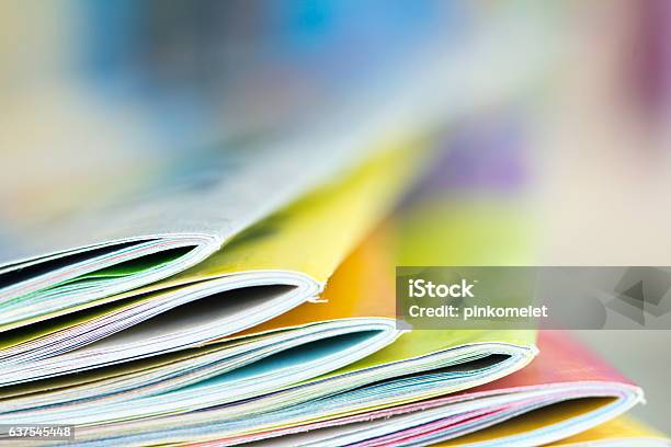 Close Up Edge Of Colorful Magazine Stacking Stock Photo - Download Image Now - Brochure, Magazine - Publication, Stack