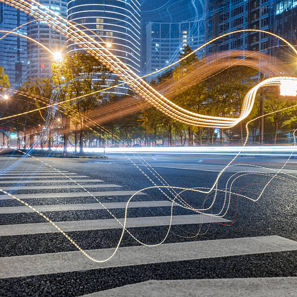 istock urban traffic with cityscape 637545798