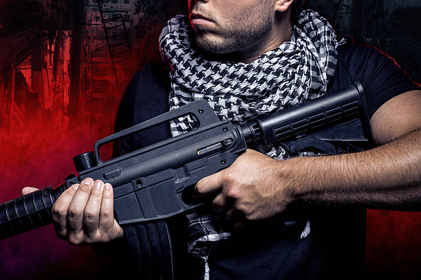 istock Soldier Invading an Urban Warzone on Fire 637548452