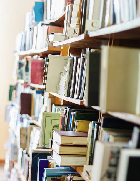 istock books on a shelf in the library, reading,  science education, 637548674