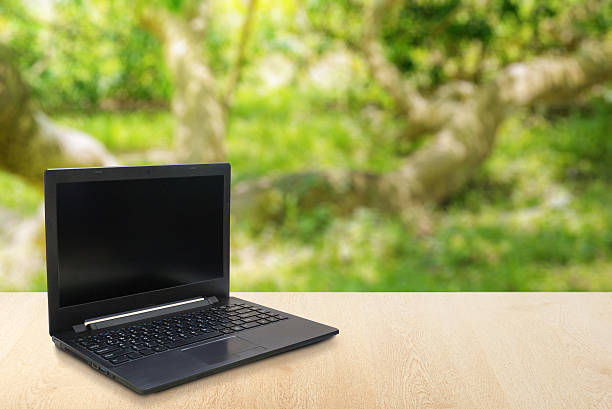 istock Computer Laptop on the table blur background with bokeh, busines 637549008