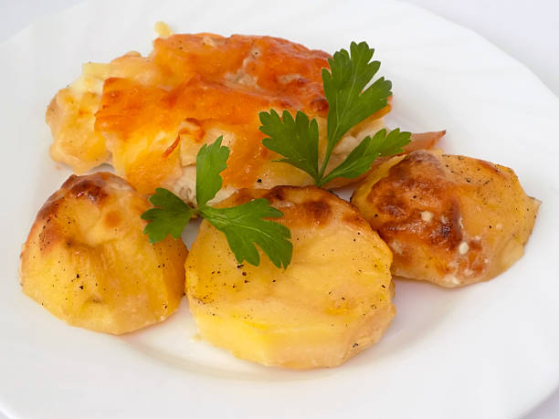 istock Chicken with potatoes and cheese. 637550034