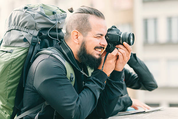 istock Young Couple Backpackers In The City 637551218