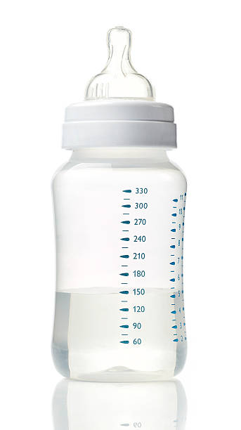 istock Water in baby bottle 637552310