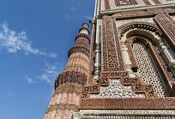 istock Qutub Minar and intricate inlay work on Alai Darwaza 637552380