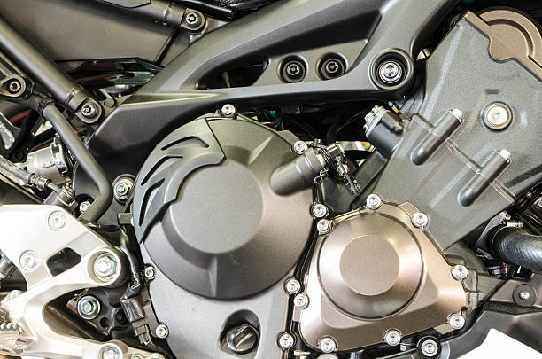 istock Motorcycle engine  machine close-up detail background . 637555198