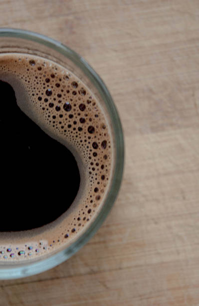 istock Delicious morning coffee on wooden background 637557032