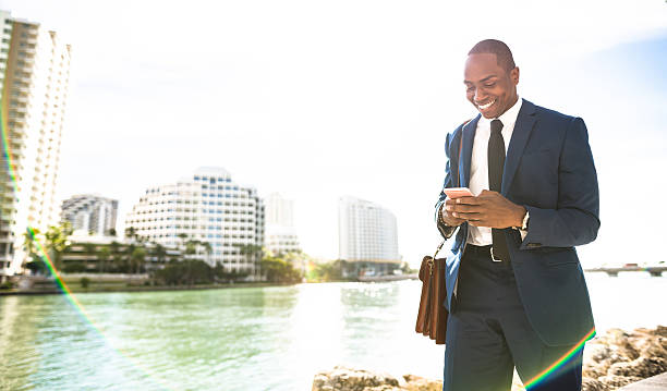 istock businessman texting in miami 637561148