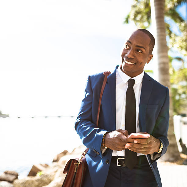 istock businessman texting in miami 637563000