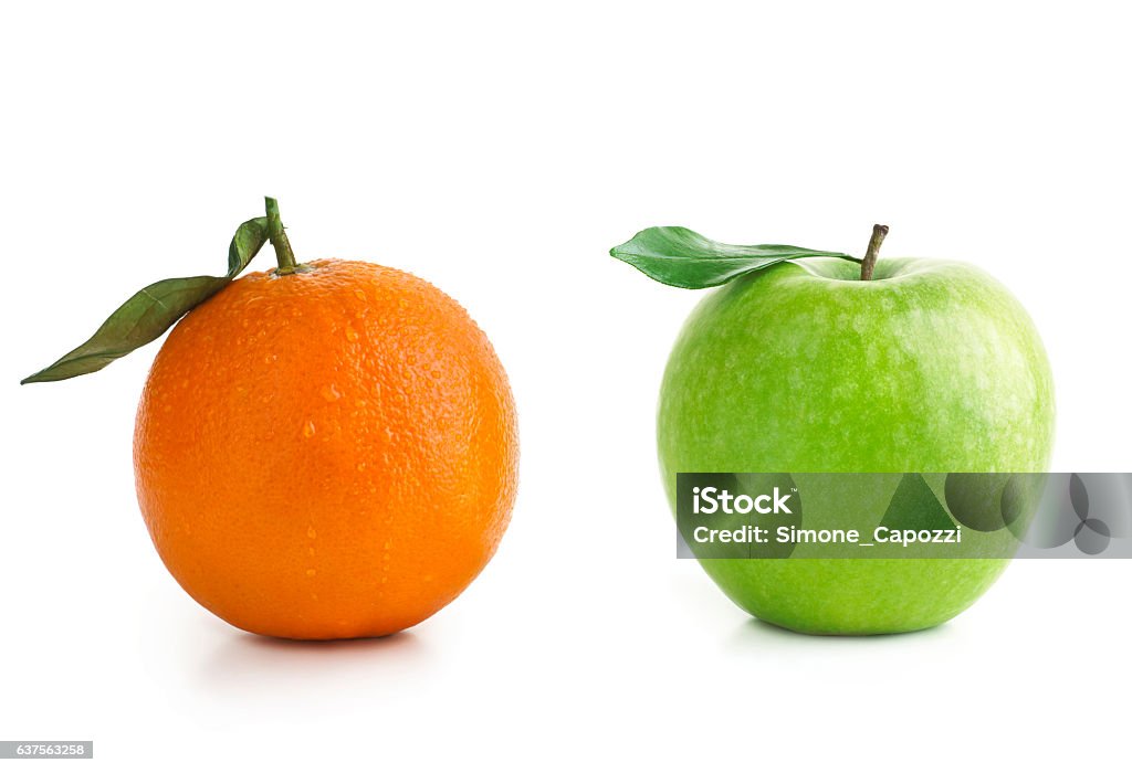 Apple and Orange difference Apple and Orange isolted on white Comparison Stock Photo