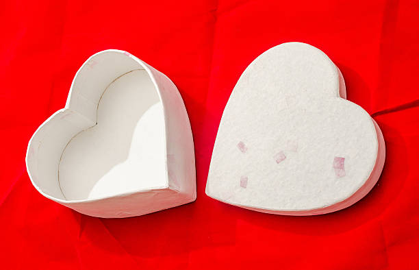 istock Heart shaped Valentines day boxes, red background, close up 637564156