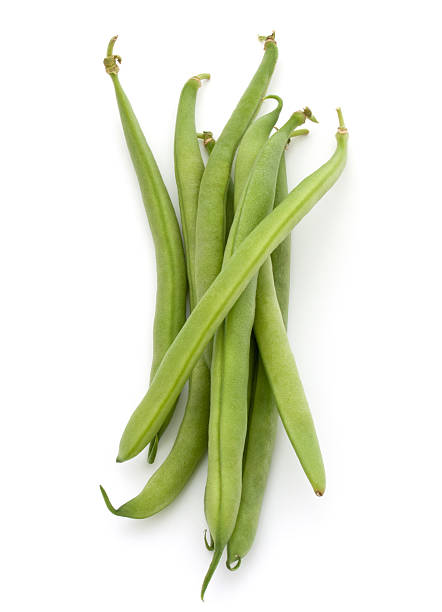 istock Green beans handful isolated on white background cutout 637564834