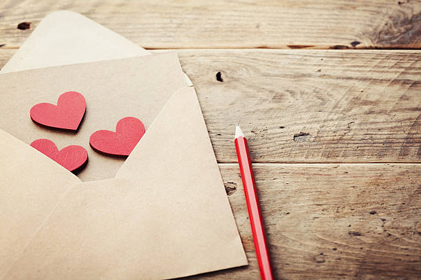 istock Envelope or letter and red hearts for Valentines love message. 637566714