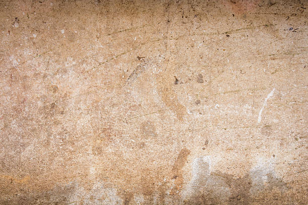 istock cracked concrete vintage wall background,old wall 637567104