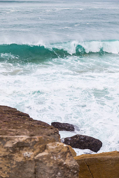 istock atlantic coastline with surfes in cloudy day 637567566