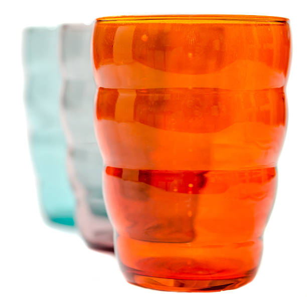 istock Colored drink glass, close up, isolated, white background 637567826
