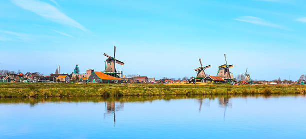 istock Panorama with windmills in Zaanse Schans, traditional village, Netherlands, North 637567976