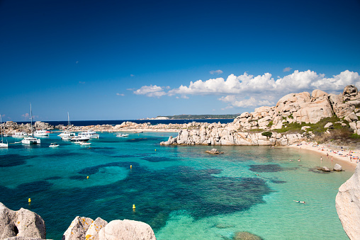 View of Cala Luna cave along the beach in summertime, Sardinia, Italy.