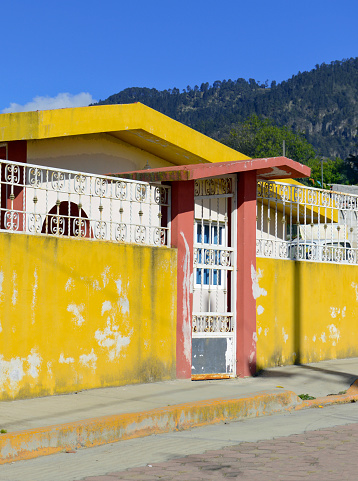 Bright yellow and Colorful traditional building in rural village in Mexico
