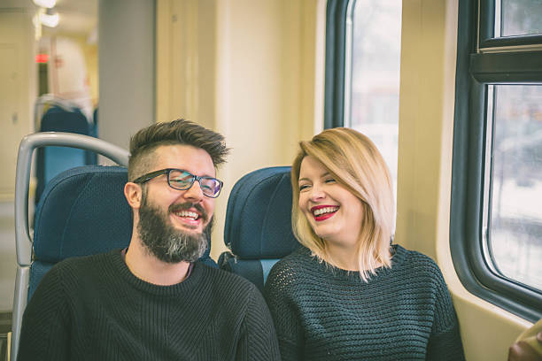istock Young couple taking a ride on a train 637578002