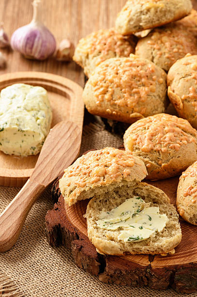 istock Homemade fresh bread buns with cheese and garlic butter. 637580588
