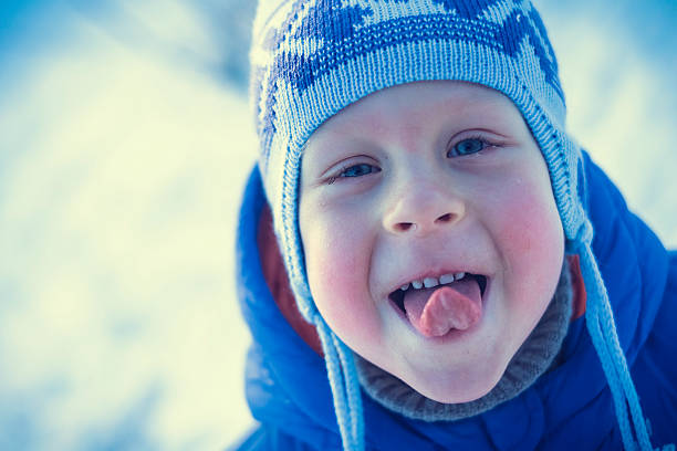 istock Little boy sticking out Tongue 637581010