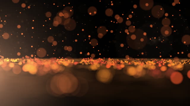 Luxurious gold sparkling particles Bounce background