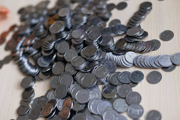 istock Ukrainian silver coins. Pyramid of money 637582394