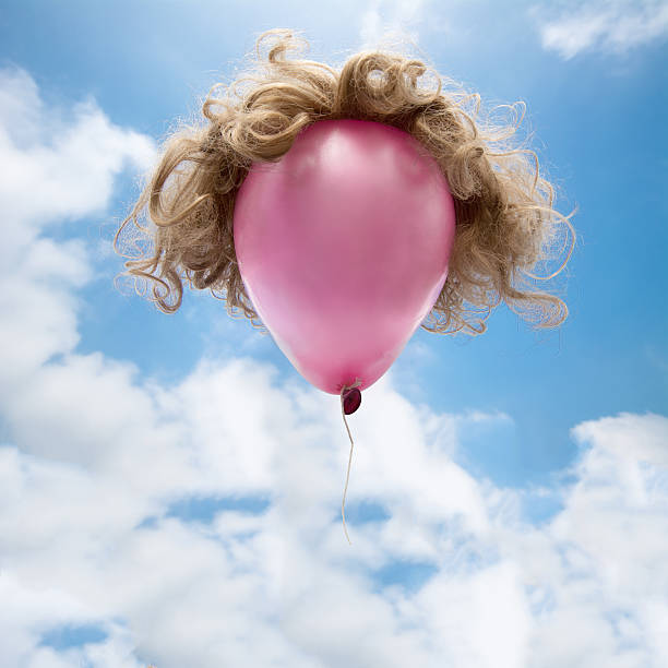 istock Pink Balloon Blond  Wig outside 637582990