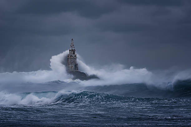 stormy cloudy day at the lighthouse, ahtopol, bulgaria - storm lighthouse cloudscape sea imagens e fotografias de stock