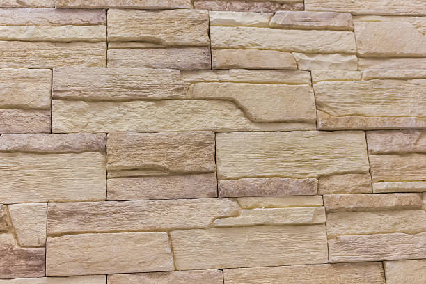 istock Brick background abstract textureweathered texture of stained old light brown 637591586